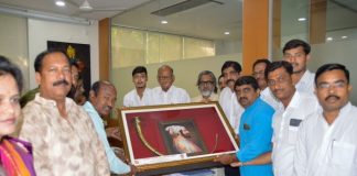 a hundred year old trumpet was presented to Mr. Pawar Saheb